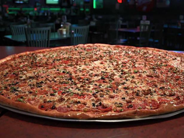 Big Lou's Pizza signature dishes Tossed Wings
Big Lou's Hot and Spicy Deluxe
The Big Texan Pizza